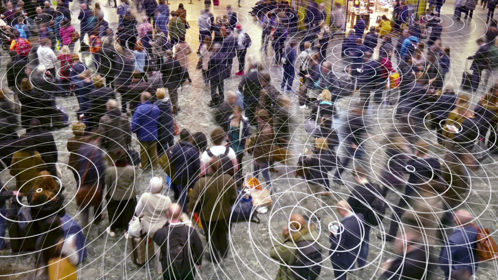 cell phone radio signals in a crowd of people.
